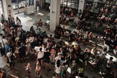 An illustrative photo of a crowd of people in the airport