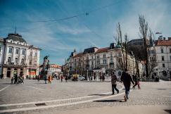An illustrative photo of people walking on the street.