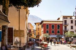 An illustrative photo of a vibrant street scene in a European town.