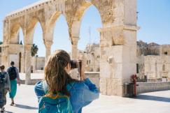 An illustrative photo of woman taking pictures.