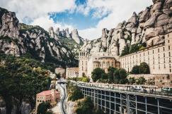 An illustrative photo of houses near mountains.