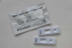 An illustrative photo of a white window envelope on a white table