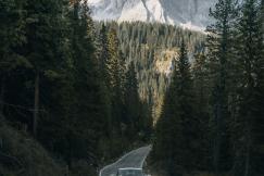 An illustrative photo of a car on a road.