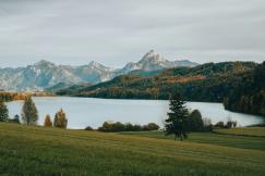 An illustrative photo of a large body of water surrounded by mountains.