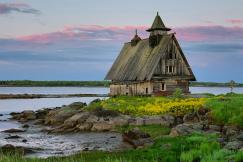 An illustrative photo of an old wooden building.