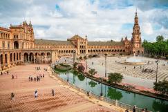 An illustrative photo of a square with fountain in Seville, Spain