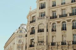 An illustrative photo of a white architectural building in Madrid, Spain