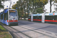 An illustrative photo of a couple of trains on tracks in Vienna