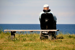 An illustrative photo of man in a wheelchair.