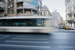 An illustrative photo of a bus riding on a street