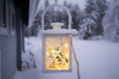 An illustrative photo of a white pendant lamp hanging on ceiling.