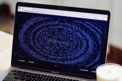An illustrative photo of a laptop on a table