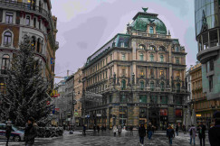 An illustrative photo of people walking on a central street in Vienna during winter.