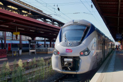 An illustrative photo of a modern train at a train station