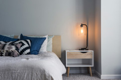 An illustrative photo of a bed.