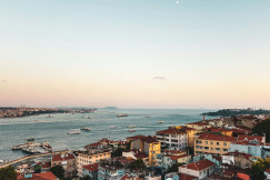 An illustrative photo of a city on a coast near a body of water