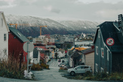An illustrative photo of a car parked on the side of the road.
