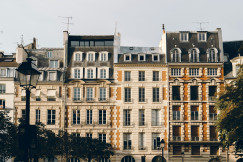 An illustrative photo of beige buildings