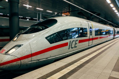 An illustrative photo of a high-speed train on a train station.