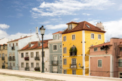 An illustrative photo of buildings of different colours.