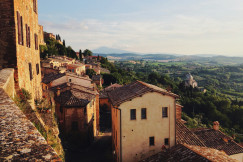 An illustrative photo of an old village on a hillside.
