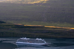 An illustrative photo of a cruise ship in a body of water.