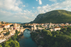An illustrative photo of a river floating in a city.