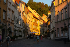 An illustrative photo of a street with buildings on both sides.