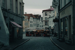 An illustrative photo of a narrow city street.