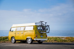 An illustrative photo of a yellow van.