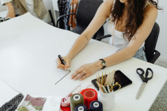 A Woman Writing on a Blank Paper with a Marker · Free Stock Photo 