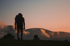 An illustrative photo of a man walking.