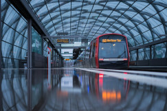 An illustrative photo of a black train in a subway.