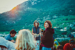 An illustrative photo of a group of people having a party in the mountains.