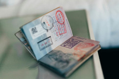 An illustrative photo of stamps in a passport.