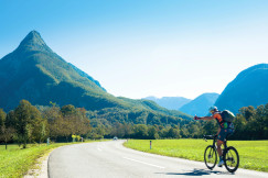An illustrative photo of a man riding a bicycle.