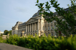 An illustrative photo of a large building with a lot of windows.