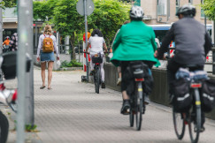 An illustrative photo of people on bicycles.