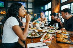 An illustrative photo of a woman eating.