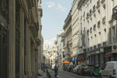 An illustrative photo of a parisian street scene.