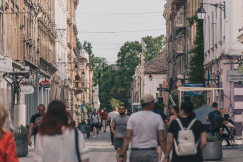 An illustrative photo of people walking on street.