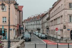 An illustrative photo of a city street filled with lots of traffic.