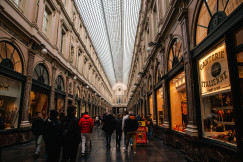 An illustrative photo of people walking in a shopping mall.