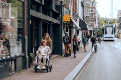 An illustrative photo of people on a street.