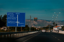 An illustrative photo of a blue and white road sign.