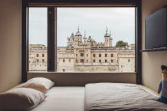 An illustrative photo of a white mattress and two pillows.