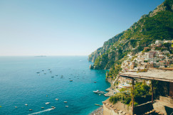 Photo by Unsplash An illustrative photo of a view of a beach with boats in the water.