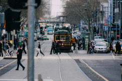 An illustrative photo of people crossing road.