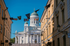 A white concrete building in Helsinki under the blue sky in a daylight