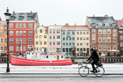 Man on a bike by the water canal